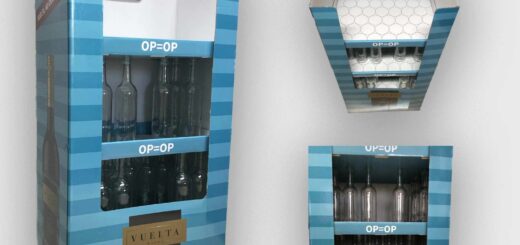Blue striped wine display units with bottles visible on the shelves, featuring 'OP=OP' signs and a VUELTA Tempranillo Merlot label; promotional top card reads 'Viva España!'